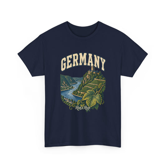 Front view of a Navy Gildan 5000 T-shirt with cream GERMANY lettering above hilltop castle, river bend, vineyard terraces, foreground vine leaf, finished with Roots & Roads script.