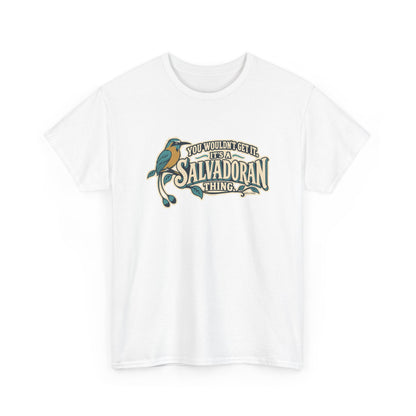 Alternate front view of the White Salvadoran Thing T-shirt with “You wouldn’t get it. It’s a Salvadoran thing.” oversized cream sign-painted lettering with teal shadows, a torogoz and integrated foliage.