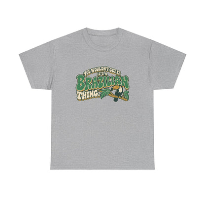 Front view of the Sport Grey Brazilian Thing T-shirt with “You wouldn’t get it. It’s a Brazilian thing.” green bubble lettering with ivory outlines, ochre shadows and an integrated toucan on a leafy branch.