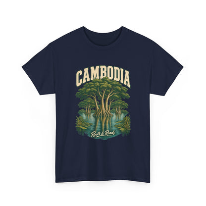 Front view of a Navy Gildan 5000 T-shirt with cream CAMBODIA lettering above green trees reflected in teal wetland water, reeds and Roots & Roads script.