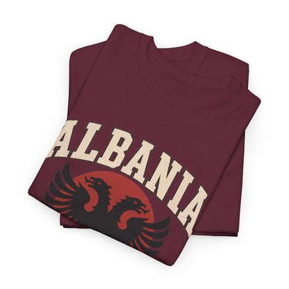 Folded Maroon Gildan 5000 T-shirt showing the Albania Fresh Prints country lettering and double-headed eagle; product-only supplier mockup.