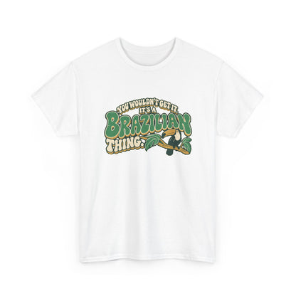 Alternate front view of the White Brazilian Thing T-shirt with “You wouldn’t get it. It’s a Brazilian thing.” green bubble lettering with ivory outlines, ochre shadows and an integrated toucan on a leafy branch.