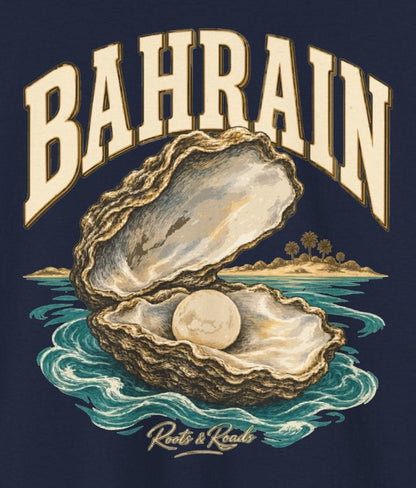 Print detail on Navy cotton showing an oyster shell, pearl, turquoise water and cream lettering and the Roots & Roads script signature.