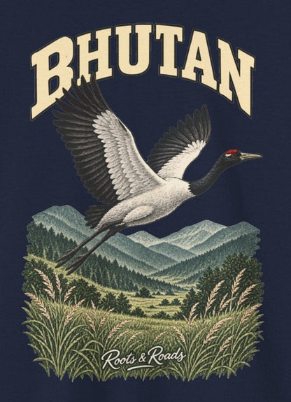 Print detail on Navy cotton showing BHUTAN lettering, a black-necked crane, layered hills, valley grasses and Roots & Roads signature.