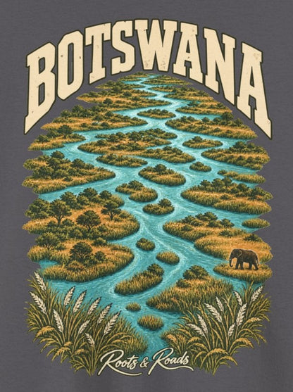 Print detail on Charcoal cotton showing BOTSWANA lettering, branching delta channels, reed islands and a small elephant, with Roots & Roads script.