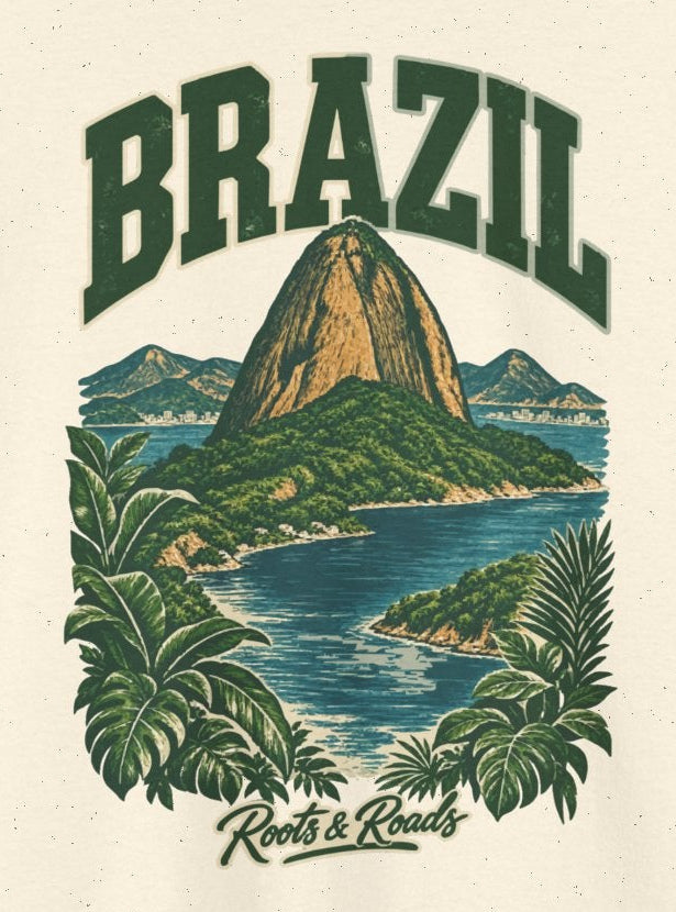 Print detail on Natural cotton showing BRAZIL lettering, a Sugarloaf-inspired mountain, bay water, tropical foliage and Roots & Roads signature.