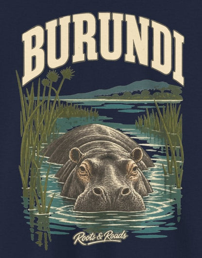 Print detail on Navy cotton showing BURUNDI lettering, a hippopotamus among blue-green water and marsh plants, with Roots & Roads script.