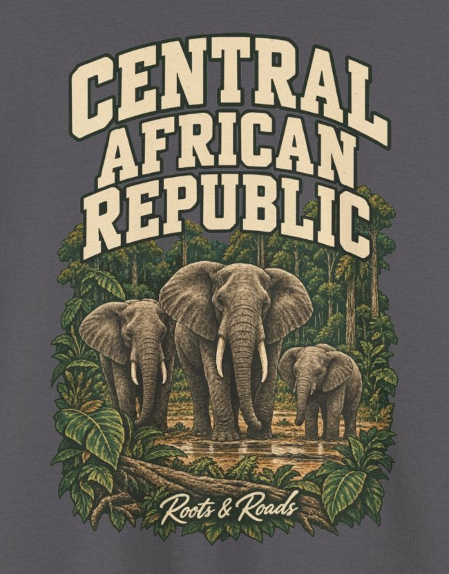 Print detail cropped from the Charcoal Central African Republic supplier T-shirt mockup, showing cream three-line CENTRAL AFRICAN REPUBLIC lettering above three forest elephants framed by leaves and Roots & Roads script.