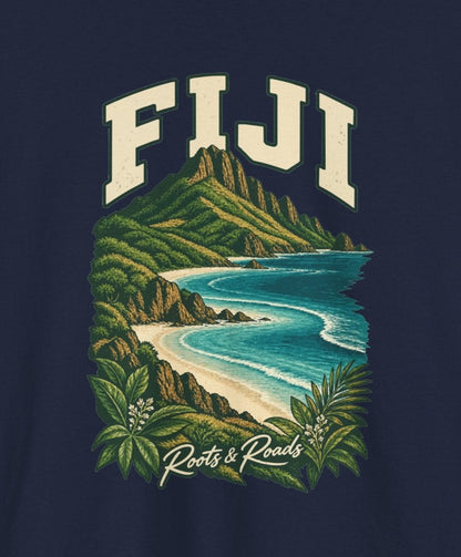 Print detail cropped from the Navy Fiji supplier T-shirt mockup, showing cream FIJI lettering, a green island ridge, pale beaches, turquoise waves and shoreline plants and Roots & Roads script.