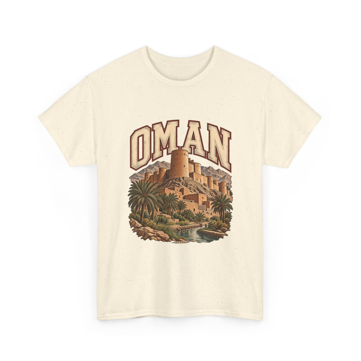 Front view of a Natural Gildan 5000 Oman T-shirt with outlined cream OMAN lettering, sandy fortress, mountains, palms, oasis and Roots & Roads plaque.