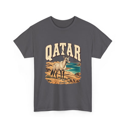 Front view of a Charcoal Gildan 5000 Qatar T-shirt with cream QATAR lettering, Arabian oryx, golden dunes, turquoise water and Roots & Roads script.