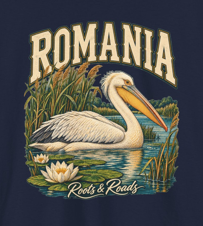 Close view of Romania Fresh Prints artwork on navy: cream ROMANIA lettering above a pelican, reeds and water lilies, with Roots & Roads script.