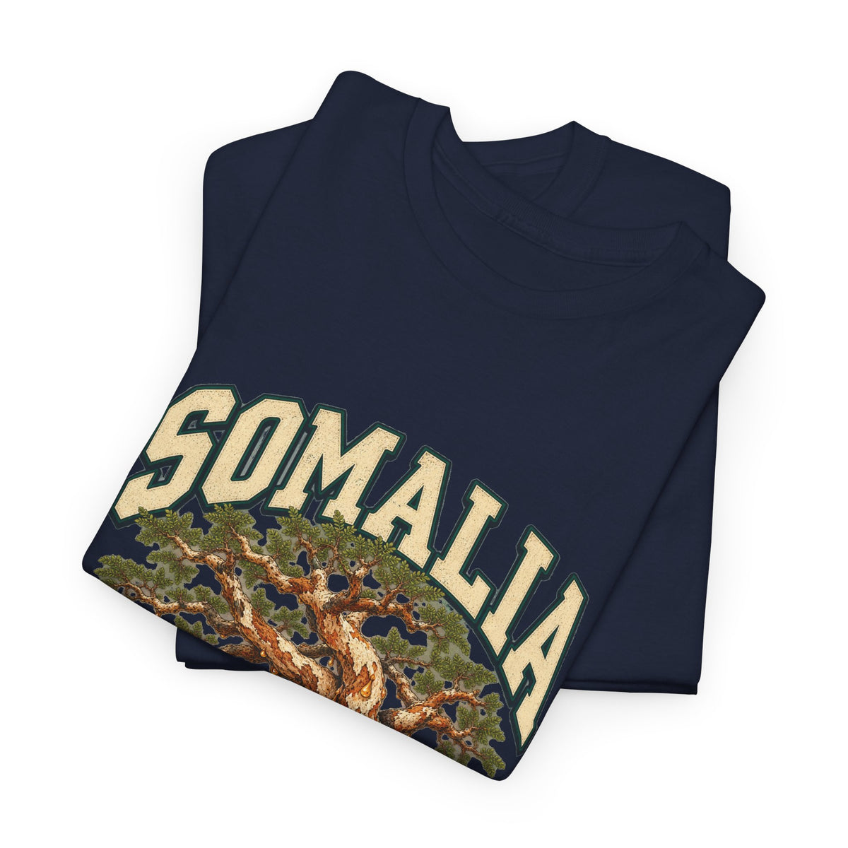 Folded Navy Somalia Fresh Prints T-shirt with cream country lettering and a gnarled tree visible.