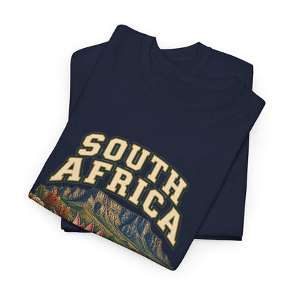 Folded Navy South Africa Fresh Prints T-shirt with cream country lettering and coastal mountain artwork visible.