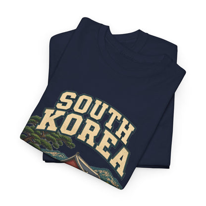 Folded Navy South Korea Fresh Prints T-shirt showing cream country lettering, pine branches and pavilion details.