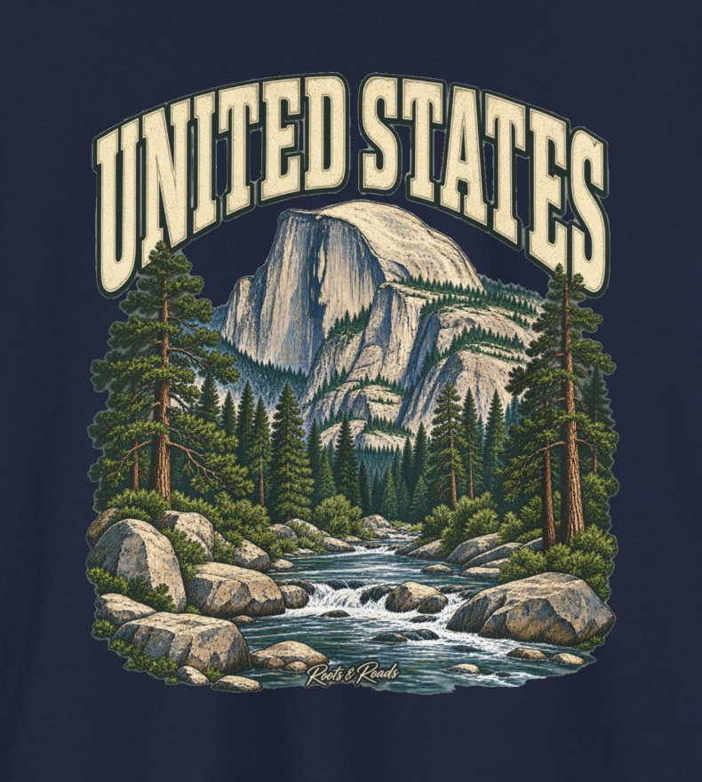 Print detail of UNITED STATES lettering above a pale granite mountain, pine trees, river, rocks and Roots & Roads signature on navy.