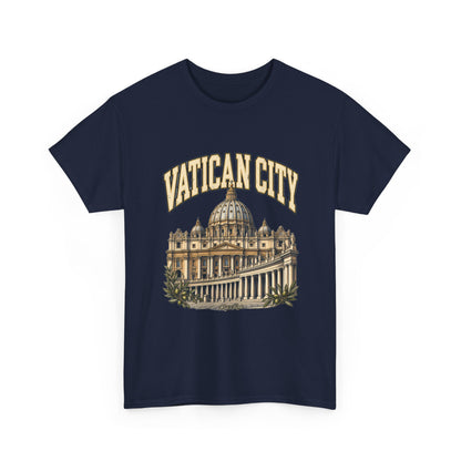 Front view of a Navy Gildan 5000 Vatican City T-shirt with cream and gold arched lettering, St Peter’s Basilica and colonnade, olive branches and Roots & Roads script.