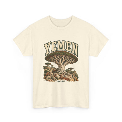 Front view of a Natural Gildan 5000 Yemen T-shirt with outlined cream lettering, dragon’s-blood tree, rocky terrain and Roots & Roads script.